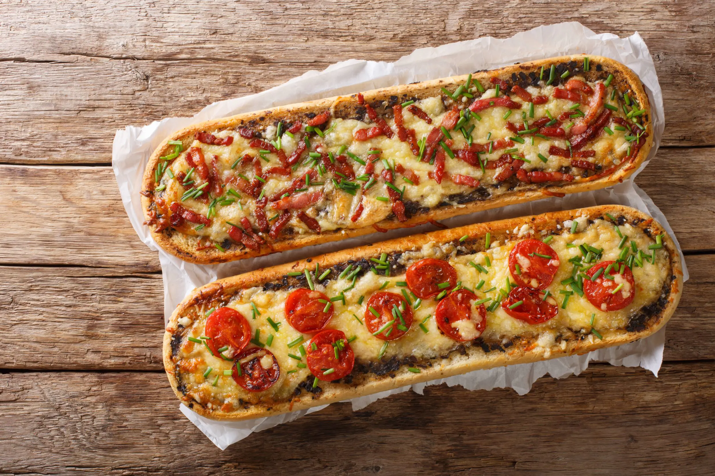 a long polish pizza Zapiekanka on the table
