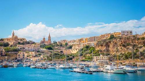 A view from the sea of Mgarr Harbour in Gozo, Malta